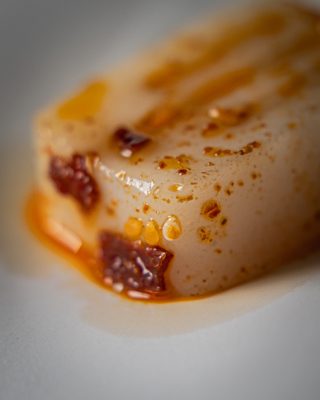 Liang Fen dell’antipasto di mare servito con olio rosso